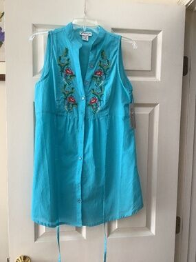 Millennium blue top. Size medium.